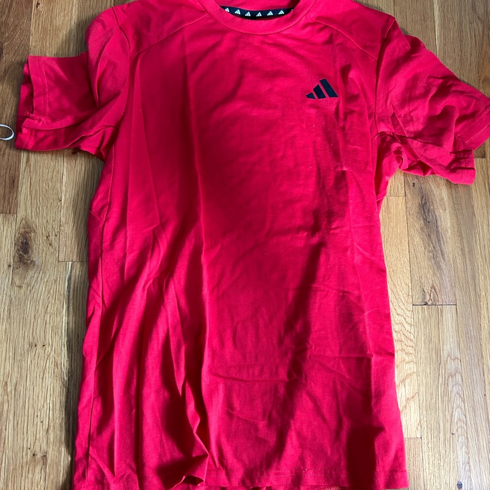 Red adidas workout shirt